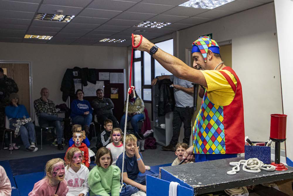 Children's entertainer 'Magic Mike' performs to the Fylingdales family 